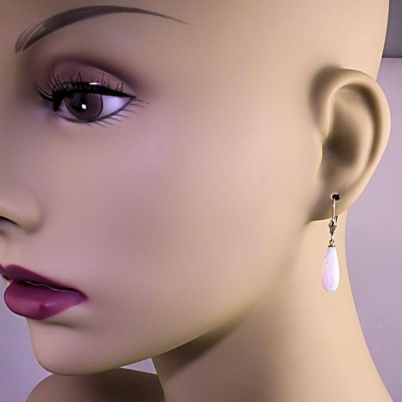 Lorraine: 16mm White Created Opal Teardrop Lever Back Earrings 14K Yellow Gold - TrustmarkJewelers.com