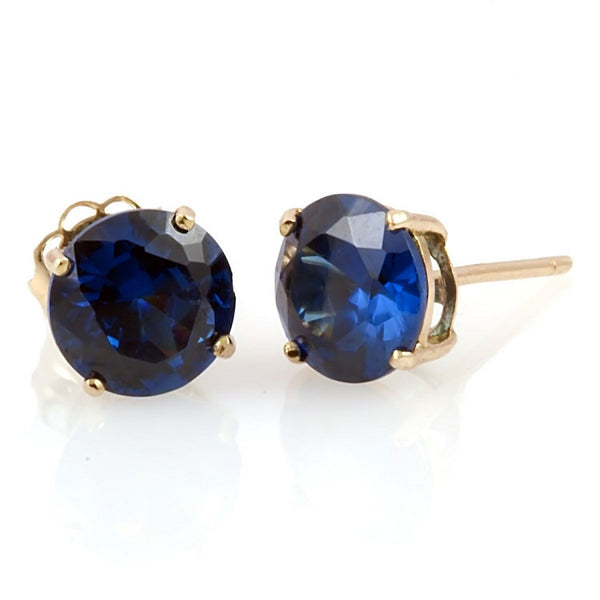 Kaye: 9mm created Sapphire 14K Yellow Gold Cast Basket Stud Earrings - Trustmark Jewelers - Earrings - 1