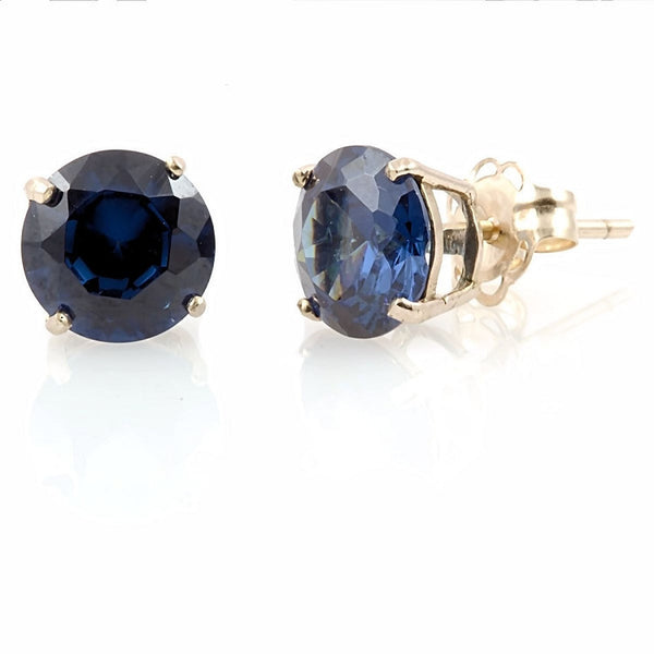 Kaye: 7mm created Sapphire 14K Yellow Gold Cast Basket Stud Earrings - Trustmark Jewelers - Earrings - 1