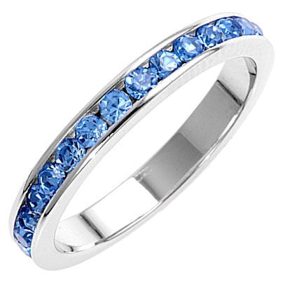 Tressa: Stackable Blue Topaz Ice CZ Birthstone Eternity Band Ring - Trustmark Jewelers - Eternity Bands